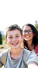 happy boy smiles with his mom outdoors