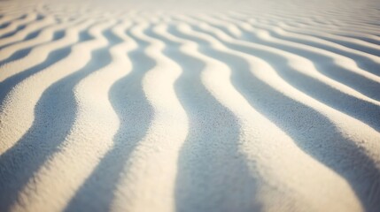 Obraz premium A close up shot of a sandy beach texture, showcasing the intricate patterns and soft grains of the sand