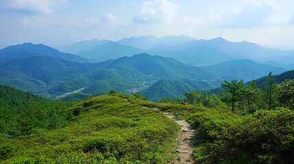 Naklejka premium Scenic view of lush mountains under a bright blue sky, perfect for nature lovers and outdoor enthusiasts.