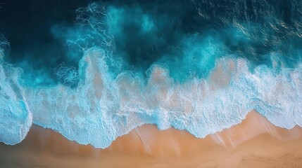 Fototapeta premium abstract aerial view of crashing waves along a tropical beach shoreline showcasing the vibrant blue hues of the ocean meeting the sandy shore creating a dynamic and captivating composition