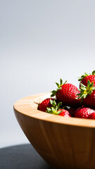 ripe red strawberries a wooden bowl