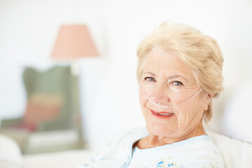 Bed, woman and portrait with oxygen tube for recovery, healing and medical service for healthcare....
