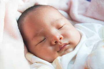 The face,One year old baby is sleeping.