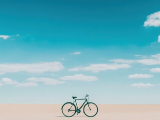 Fototapeta premium A solitary bicycle stands in a vast, open landscape under a clear blue sky, evoking a sense of freedom and adventure.