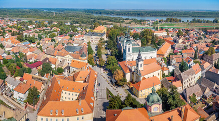 A panoramic aerial view of Sremski Karlovci highlights the stunning summer landscape, with its...