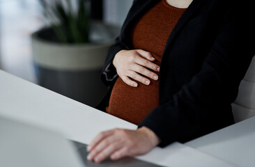 Laptop, pregnant woman and hands on stomach in office for prenatal blog, maternity and content writer in startup. Pregnancy, touch abdomen and employee on computer for business or creative article