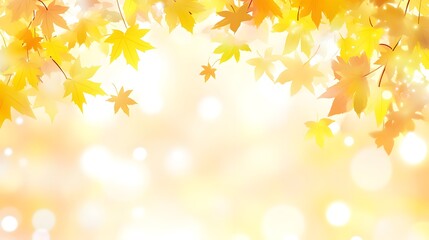 Fototapeta premium A serene autumn background with golden leaves and soft bokeh effect.