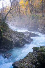 gorge with a river in the mountains, blue water, blue river, waterfalls, rocks and mountains