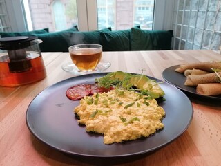 fried eggs with bacon and cheese