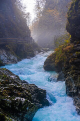 gorge with a river in the mountains, blue water, blue river, waterfalls, rocks and mountains