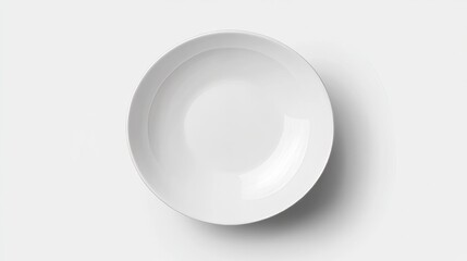 Plain white ceramic plate on a white background, simple and clean.

