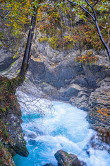gorge with a river in the mountains, blue water, blue river, waterfalls, rocks and mountains