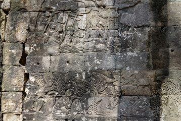 Bas-relief Sculpture at Bayon temple in Angkor Thom, Siem Reap, Cambodia.