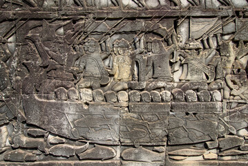 Obraz premium Bas-relief Sculpture at Bayon temple in Angkor Thom, Siem Reap, Cambodia.