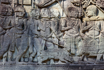 Obraz premium Bas-relief Sculpture at Bayon temple in Angkor Thom, Siem Reap, Cambodia.