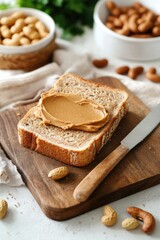 Slice of whole wheat bread topped with smooth peanut butter. A wholesome and satisfying quick bite.