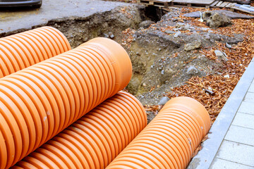 HDPE polyethylene sewer pipes are ready for installation on construction site