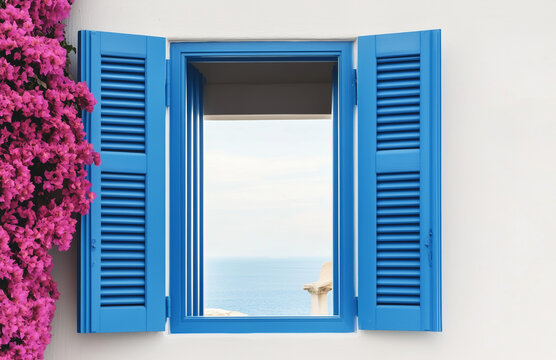 Fototapeta beautiful house in Andalusia, Spain next to the sea with an open window in which you can see the blue sea through another window on the other side of the house