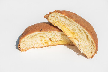 halved Coffee bread on white background