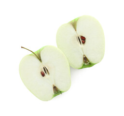 Halves of green apple isolated on white, top view