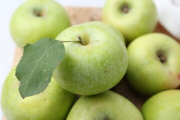 Fresh ripe green apples on table, closeup