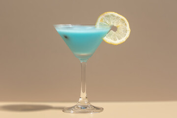 Tropical Blue Margarita Cocktail in Martini Glass Setting. Appeals to tropical getaway themes, enhancing beverage photography.