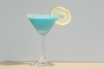 Blue Margarita in Martini Glass for a Tropical Vibe. Fits perfectly in branding for tropical resorts or cocktail-themed visuals.