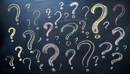 Colorful Question Marks on Blackboard Background