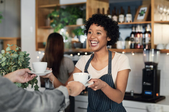 Waitress, happy and customer with coffee order in cafe for breakfast, retail sale and hospitality service. Small business, barista and serving latte beverage by counter in bistro for caffeine drink - Powered by Adobe