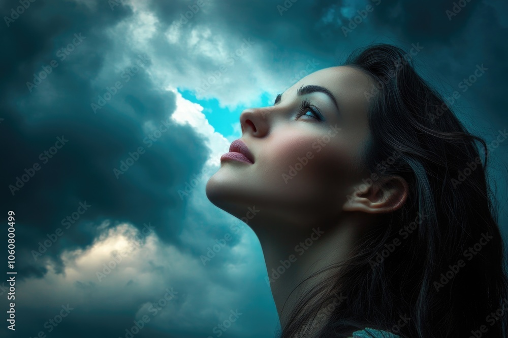 Poster a person looking upwards towards the clouds in a clear blue sky, great for use in illustrations or a