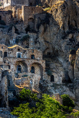 Abandoned ruins of the ghost town of Craco. A city abandoned due to an earthquake in the late 20th century. Province of Matera, Basilicata, Italy