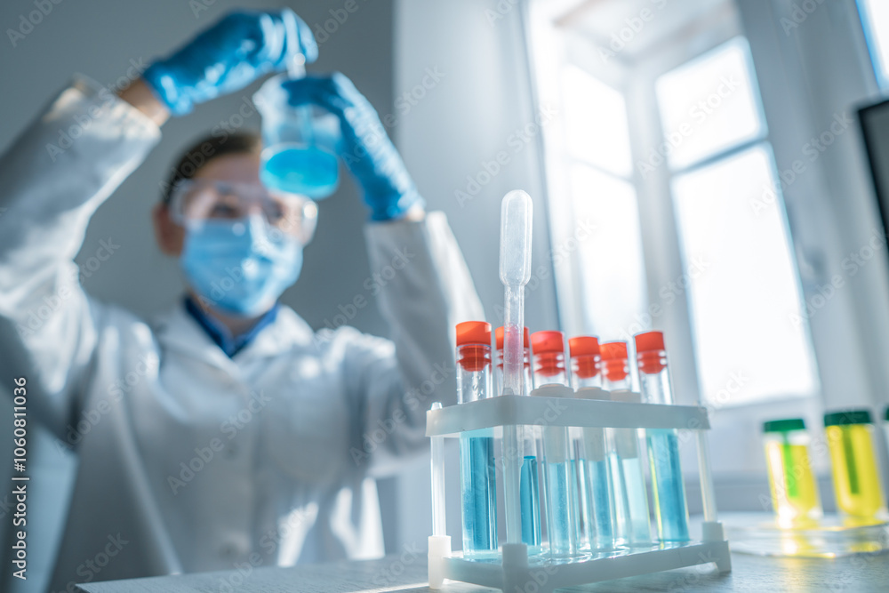 Poster a young scientist is actively engaged in conducting a variety of scientific experiments within the c
