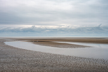Cumber Sands on an autumn day, view of the beach and the English Channel, East Sussex, England