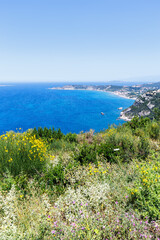 View of Arillas Bay with turquoise sea portrait format on Corfu island in Greece