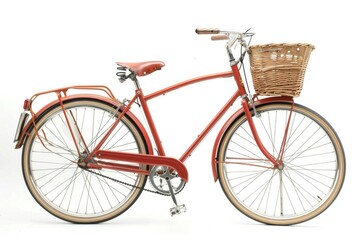 Naklejka premium A bright red bicycle with a woven wicker basket attached to the back, perfect for daily commutes or casual rides