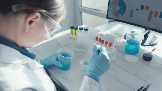 An experienced scientist is diligently conducting a variety of intricate laboratory experiments that involve working with chemical solutions and performing indepth data analysis to ensure accuracy