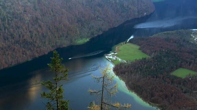 St. Bartholoma on Konigssee in Bavaria, Germany, is breathtaking landmark surrounded by Bavarian Alps aerial view of mountain viewpoint. Luftaufnahme St. Bartholoma Wallfahrtskirche Berchtesgadener. 