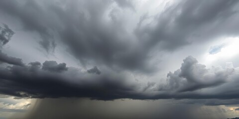 Obraz premium Dramatic storm clouds gathering over the horizon, creating a sense of foreboding and impending doom, looming, danger