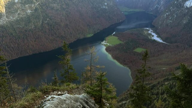 St. Bartholoma on Konigssee in Bavaria, Germany, is breathtaking landmark surrounded by Bavarian Alps aerial view of mountain viewpoint. Luftaufnahme St. Bartholoma Wallfahrtskirche Berchtesgadener. 