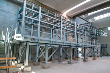 Interior of a construction site, large empty room