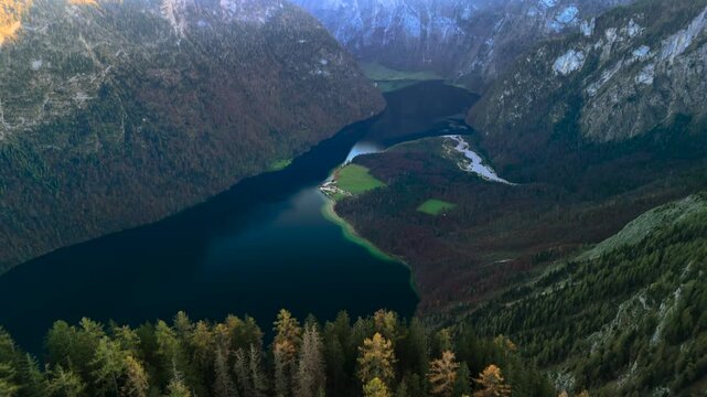St. Bartholoma on Konigssee in Bavaria, Germany, is breathtaking landmark surrounded by Bavarian Alps aerial view of mountain viewpoint. Luftaufnahme St. Bartholoma Wallfahrtskirche Berchtesgadener. 