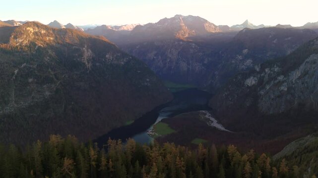 St. Bartholoma on Konigssee in Bavaria, Germany, is breathtaking landmark surrounded by Bavarian Alps aerial view of mountain viewpoint. Luftaufnahme St. Bartholoma Wallfahrtskirche Berchtesgadener. 