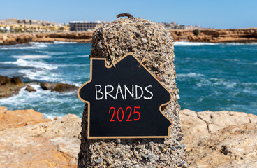Planning brands 2025 new year symbol. Concept words Brands 2025 on beautiful yellow chalk...