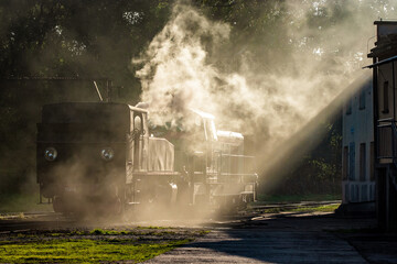 Old steam locomotive in the sunlight.