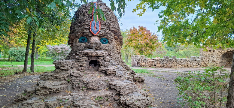 Decorative head of a knight made of stone. 
The beautiful head of the knight is paved with shell rock. This is a fairy-tale character from the poem "Ruslan and Ludmila" written by A.S. Pushkin in 1818