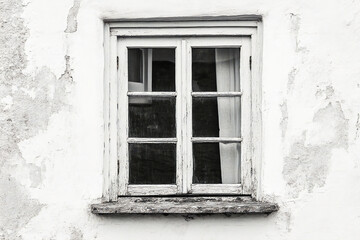 wooden frame of a white window on a white background