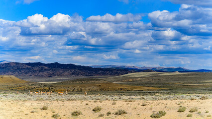 Rain clouds during the day over the plains in Utah, USA