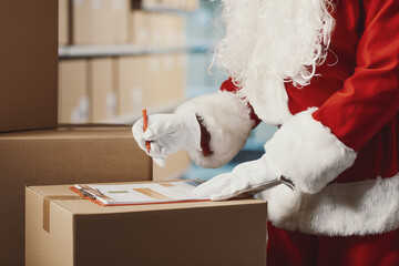 Santa Claus working at the warehouse