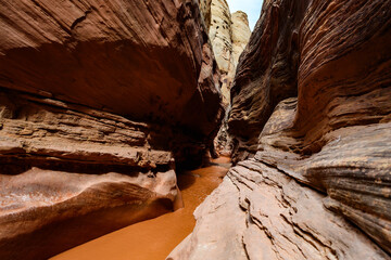 Eroded by water and wind cliffs in the canyon Little Wild Horse Canyon. San Rafael Swell, Utah