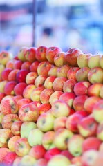Fresh ripe red apples as background, top view